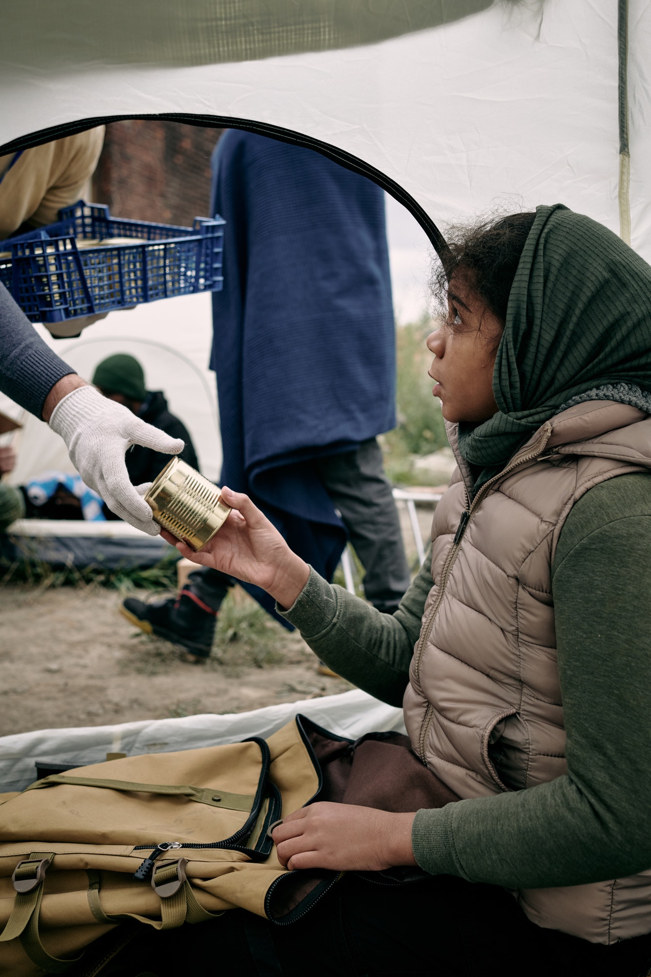 hungry-girl-refugee-taking-tinned-food-from-gloved-hand-of-volunteer.jpg hungry-girl-refugee-taking-tinned-food-from-gloved-hand-of-volunteer.jpg
